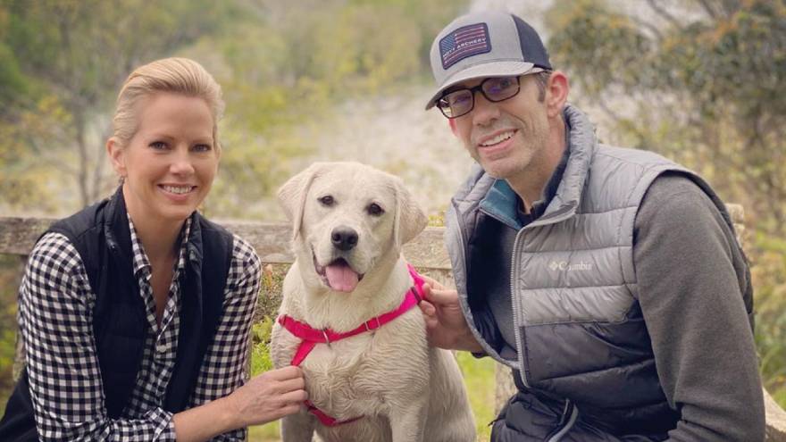 Image of successful journalist, Shannon Bream with her husband and dog