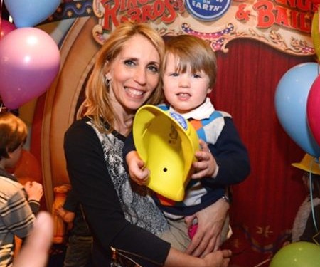 Image of renowned journalist, Dana Bash and her son