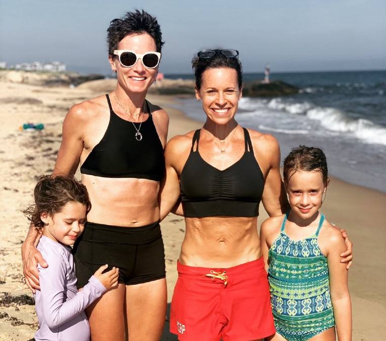 Image of journalist couple, Jenna Wolfe and Stephanie Gosk and their daughter